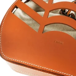 Small kayan round bucket bag